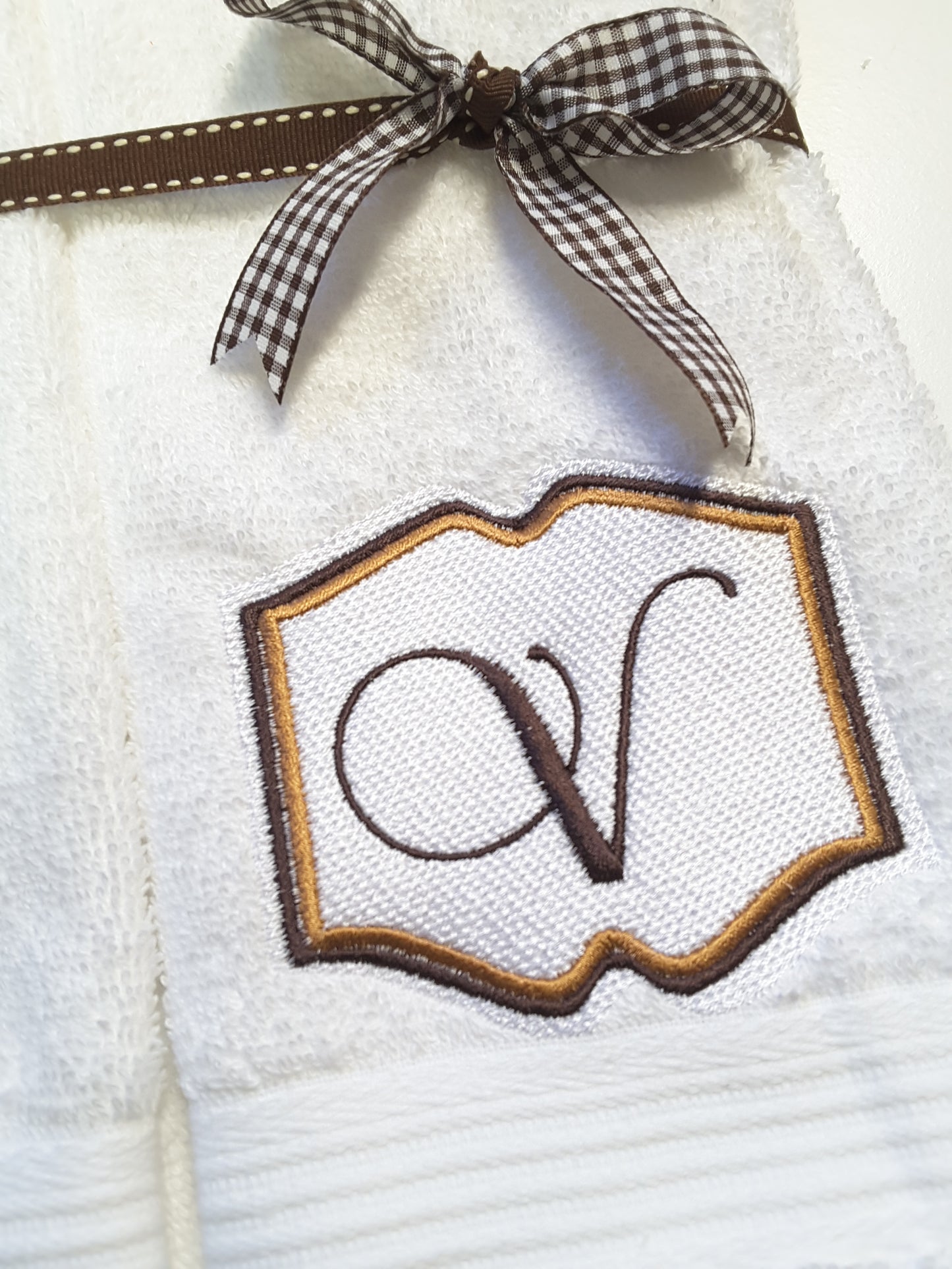 Embossed embroidery monograms